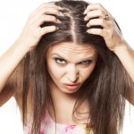 Girl noticing thinning hair