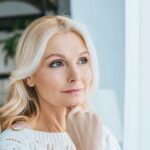 middle aged woman experiencing hair thinning and loss - unique solutions in New Bedford